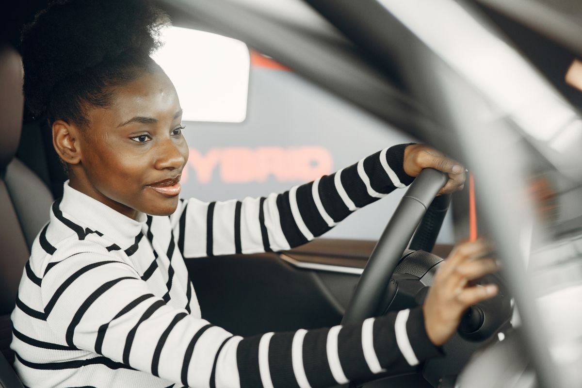 Driver smiling behind the wheel